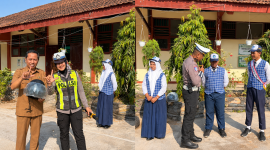 Anggota Satlantas saat membagikan helm kepada Guru dan Siswa.SMPN 5 Sumenep 