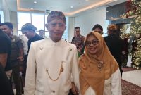 Dirut BPRS Bhakti Sumekar, H. Hairil Fajar bersama Istri saat menghadiri Paripurna Hari Jadi Sumenep ke-757 